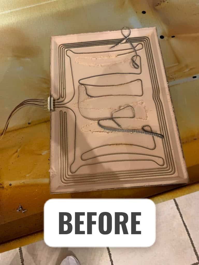 Damaged oven heating element before replacement during appliance repair